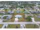 Single story home with a spacious yard and driveway at 817 E 6Th St, Englewood, FL 34223