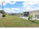 Large backyard with patio, providing ample outdoor space at 817 E 6Th St, Englewood, FL 34223