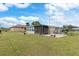 Spacious backyard with patio and plenty of grass at 817 E 6Th St, Englewood, FL 34223