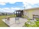 Backyard with patio, a yellow bicycle, and storage at 817 E 6Th St, Englewood, FL 34223