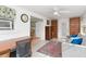 Sunroom with built-in shelving and comfortable seating at 817 E 6Th St, Englewood, FL 34223