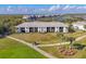 Aerial view showing building location and surrounding golf course at 14070 Heritage Landing Blvd # 423, Punta Gorda, FL 33955