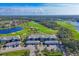 Aerial view of community with golf course and lake at 14070 Heritage Landing Blvd # 423, Punta Gorda, FL 33955
