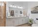 Clean bathroom with double vanity and granite countertop at 14070 Heritage Landing Blvd # 423, Punta Gorda, FL 33955