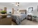 Spacious bedroom with ceiling fan and patterned bedding at 14070 Heritage Landing Blvd # 423, Punta Gorda, FL 33955
