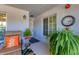 Relaxing front porch with seating and plants at 14070 Heritage Landing Blvd # 423, Punta Gorda, FL 33955