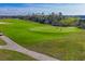 Golf course with players on the green at 14070 Heritage Landing Blvd # 423, Punta Gorda, FL 33955