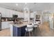Modern kitchen with stainless steel appliances and large island at 14070 Heritage Landing Blvd # 423, Punta Gorda, FL 33955