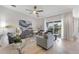 Bright living room with comfy seating and large windows at 14070 Heritage Landing Blvd # 423, Punta Gorda, FL 33955