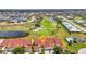 Scenic aerial view of home near golf course and lakes with lovely landscaping in a desirable community at 1640 Atares Dr # 6, Punta Gorda, FL 33950