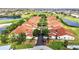 Breathtaking aerial shot of townhomes with a beautiful golf course and ponds, offering a peaceful setting at 1640 Atares Dr # 6, Punta Gorda, FL 33950