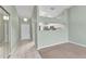 Neutral living room featuring tile entry and carpet, and a pass-through to the kitchen at 1640 Atares Dr # 6, Punta Gorda, FL 33950