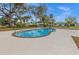 Inviting kidney-shaped pool, perfect for relaxation at 20191 Gladstone Ave, Port Charlotte, FL 33952