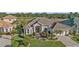 Luxury home with tile roof and lush landscaping at 2163 Silver Palm Rd, North Port, FL 34288