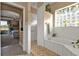 Main bathroom with walk-in shower, tile flooring, and a view of the bedroom at 2163 Silver Palm Rd, North Port, FL 34288