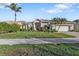 Beautiful one-story home with landscaped yard and driveway at 2163 Silver Palm Rd, North Port, FL 34288
