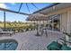 Spacious patio with tiki bar and comfortable seating at 2163 Silver Palm Rd, North Port, FL 34288