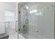 Bathroom with shower/tub combo, grab bars, and updated fixtures at 303 Paramaribo St, Punta Gorda, FL 33983