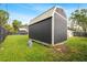 Spacious storage shed with a gable roof and ample storage space at 340 Carmel Rd, Venice, FL 34293