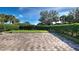 Spacious backyard with a large brick patio at 4261 River Bank Way, Punta Gorda, FL 33980