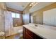 Clean bathroom with a shower/tub combo and vanity at 4261 River Bank Way, Punta Gorda, FL 33980
