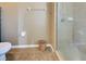 Small bathroom with shower stall, toilet, and tile floor at 4261 River Bank Way, Punta Gorda, FL 33980