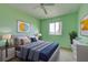 Bedroom with bed, nightstands, and dresser at 4261 River Bank Way, Punta Gorda, FL 33980