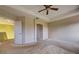 Primary bedroom with doors to bathroom and loft area at 4261 River Bank Way, Punta Gorda, FL 33980