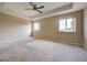 Spacious bedroom with carpeted floors and neutral walls at 4261 River Bank Way, Punta Gorda, FL 33980