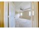 Large bedroom with ceiling fan and carpet at 4261 River Bank Way, Punta Gorda, FL 33980