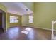 Spacious dining room with tile floors and large windows at 4261 River Bank Way, Punta Gorda, FL 33980