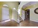 Bright entryway with tile floors and staircase at 4261 River Bank Way, Punta Gorda, FL 33980