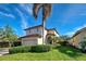 Two-story house with a two-car garage and manicured lawn at 4261 River Bank Way, Punta Gorda, FL 33980