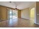 Gathering room with sliding doors to patio and tile floors at 4261 River Bank Way, Punta Gorda, FL 33980