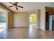 Gathering room with access to kitchen and outdoor patio at 4261 River Bank Way, Punta Gorda, FL 33980