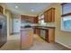 Kitchen with stainless steel appliances and granite countertops at 4261 River Bank Way, Punta Gorda, FL 33980