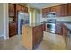 Kitchen with stainless steel appliances and granite countertops at 4261 River Bank Way, Punta Gorda, FL 33980
