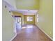 Spacious living room with tile floors and high ceilings at 4261 River Bank Way, Punta Gorda, FL 33980