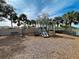 playground with swings and climbing equipment at 4261 River Bank Way, Punta Gorda, FL 33980