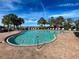 Community pool with plenty of lounge chairs at 4261 River Bank Way, Punta Gorda, FL 33980