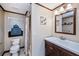 Bathroom with a vanity, toilet, and shower at 749 Portwine Ct, Englewood, FL 34223