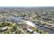 Expansive aerial view of a waterfront community with a network of canals and numerous single Gathering homes at 4107 Rock Creek Dr, Port Charlotte, FL 33948