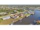 High-angle aerial picture showcases waterfront residences with private boat docks and lifts by the canal at 4107 Rock Creek Dr, Port Charlotte, FL 33948