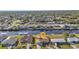 Aerial view of a waterfront property with canal access and lush surroundings in a residential neighborhood at 4107 Rock Creek Dr, Port Charlotte, FL 33948