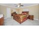 Bedroom featuring large closet doors and a large window at 109 Peckham Se St, Port Charlotte, FL 33952