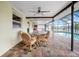 This patio has a brick floor and outdoor dining set at 109 Peckham Se St, Port Charlotte, FL 33952