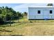 Exterior of a shed in the backyard with fence at 12143 Du Barry Ave, Port Charlotte, FL 33981