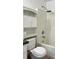 Standard bathroom features a shower and bath combo, toilet, and vanity with storage at 12143 Du Barry Ave, Port Charlotte, FL 33981