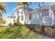 Lovely single-story home with a well-manicured lawn and lush landscaping at 193 Beeney Se Rd, Port Charlotte, FL 33952