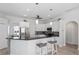 Modern kitchen with stainless steel appliances, sleek countertops, and ample cabinet space for storage at 193 Beeney Se Rd, Port Charlotte, FL 33952